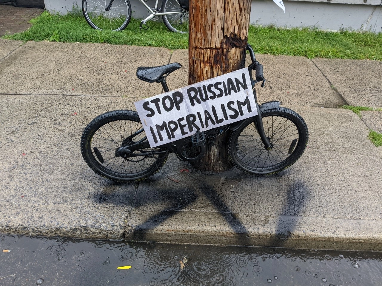 stop russian imperialism sign on a bike