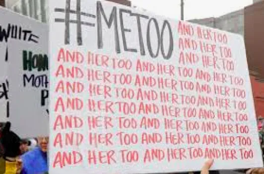 person holding up meetoo sign